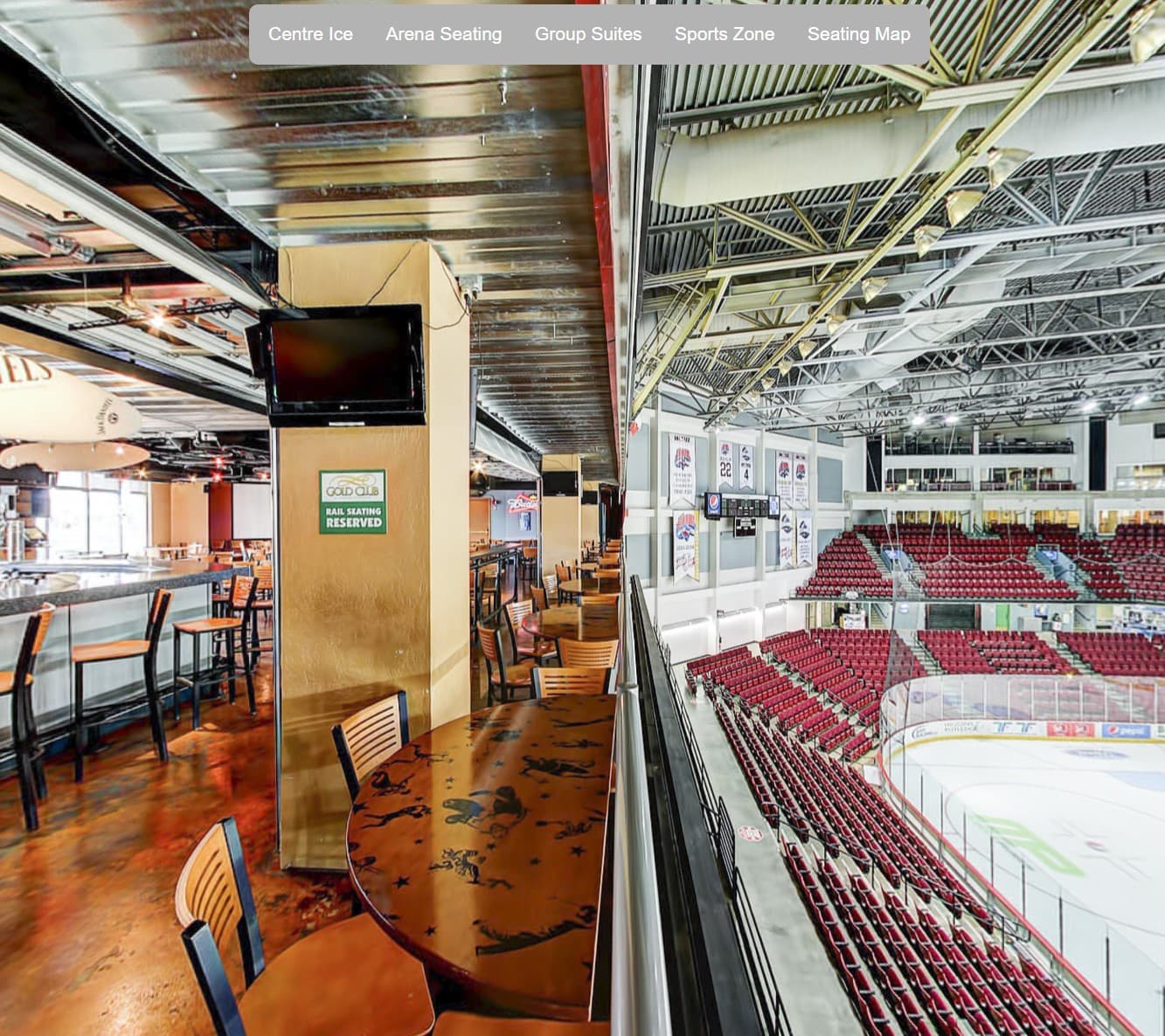 Reserved Sports Zone rail-side table overlooking the ice
